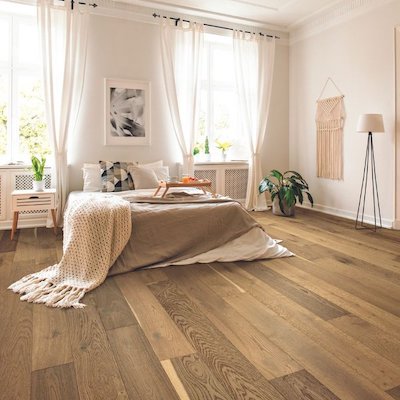 wide planked hardwood flooring in a bedroom